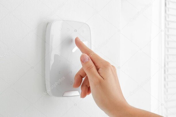 Intruder alarm control panel installed in an office