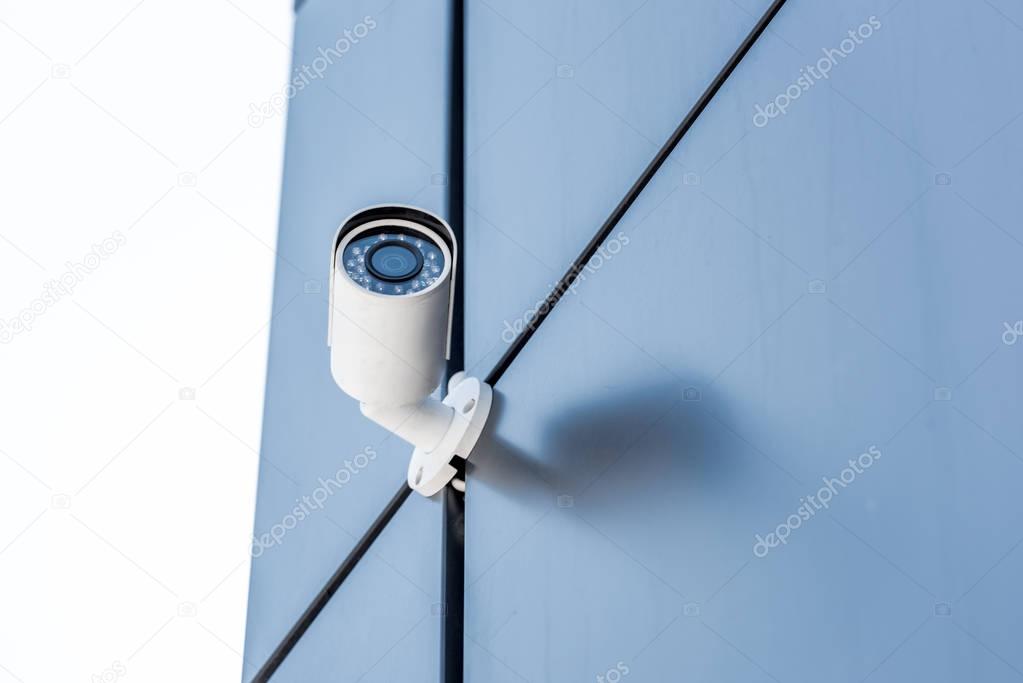 Modern office building entrance with security cameras