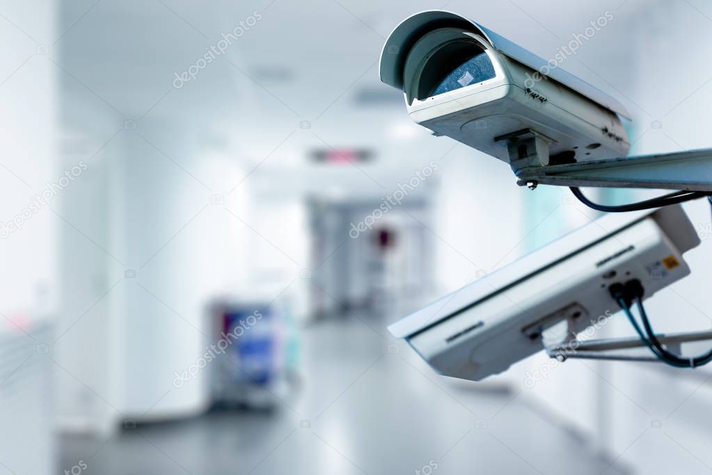 Healthcare clinic corridor with discreet CCTV camera