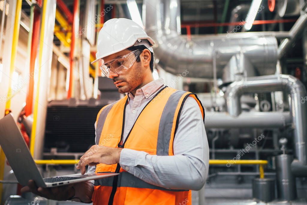 Technician performing scheduled maintenance on security equipment